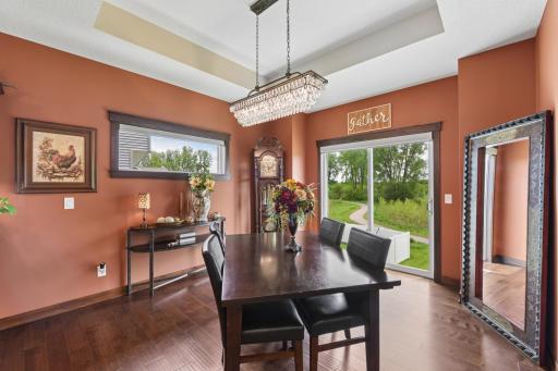 Patio door to your future deck overlooks the beautiful backyard that backs up to lovely trails.