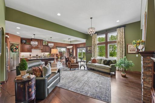 Open concept through the living, kitchen, and dining areas makes this space truly feel grand.