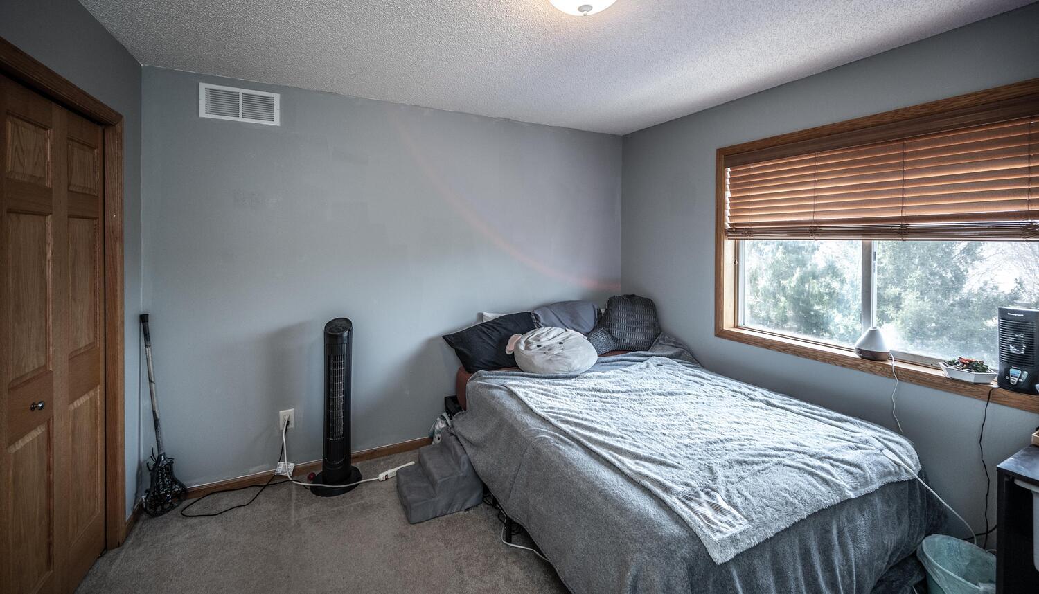 1122 Drew Dr Woodbury MN 55129-large-038-039-Bedroom 4-1500x858-72dpi.jpg