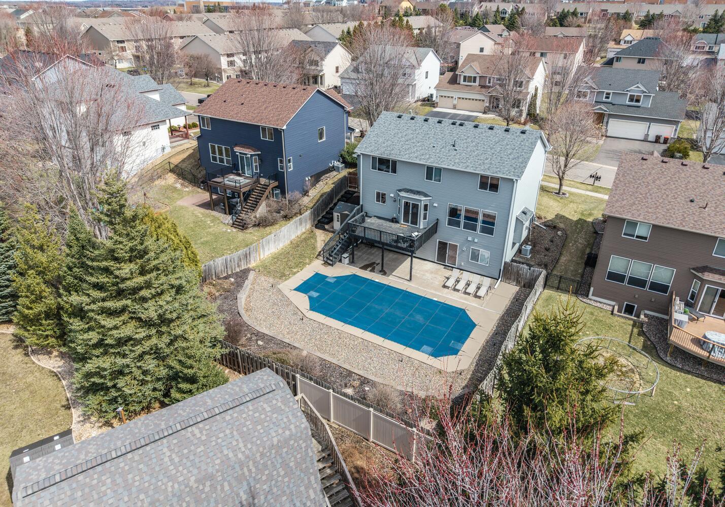 1122 Drew Dr Woodbury MN 55129-large-002-042-Back of Home-1428x1000-72dpi.jpg