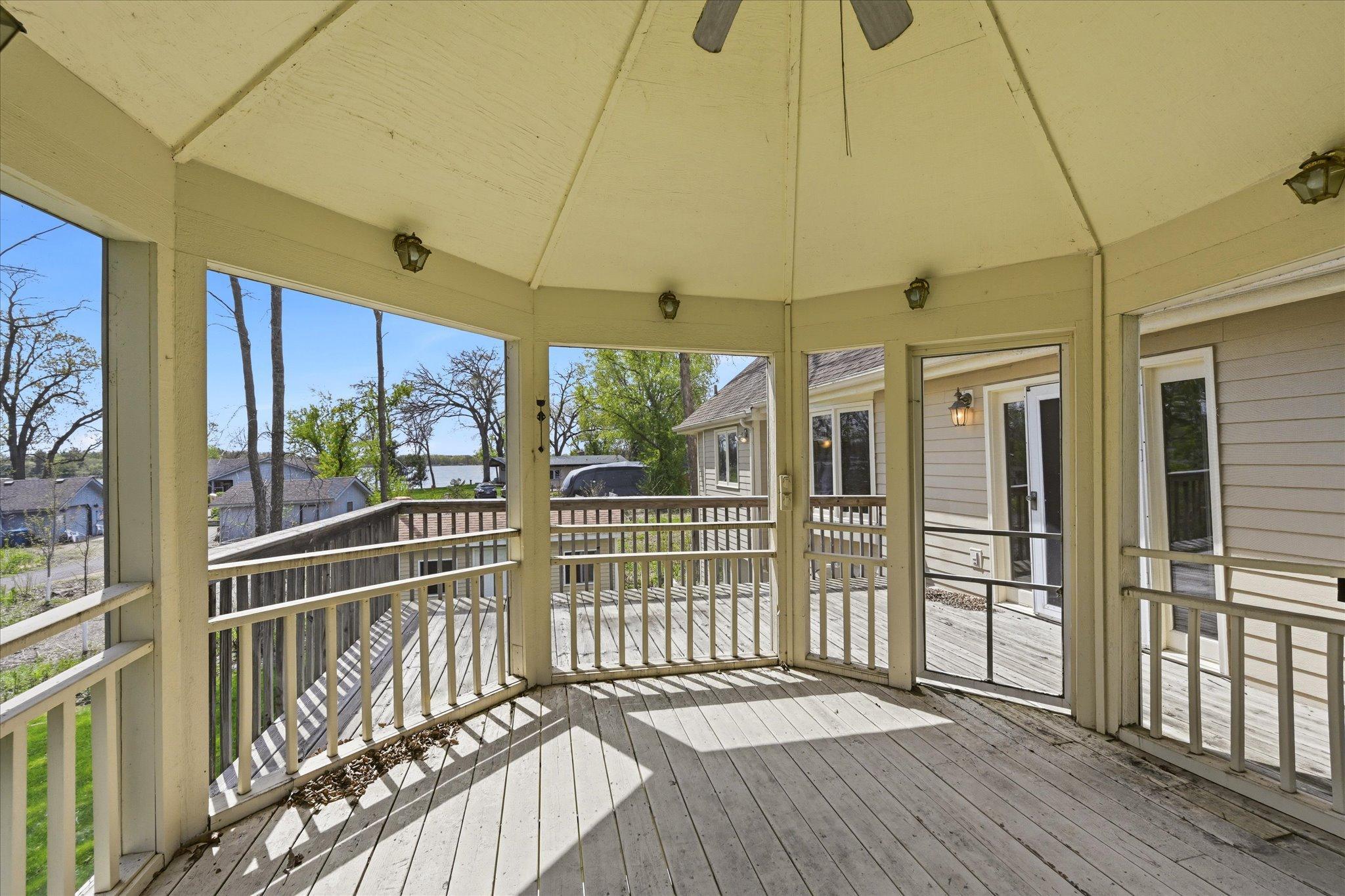 13-21955 Finley Ct N gazebo with a lake view