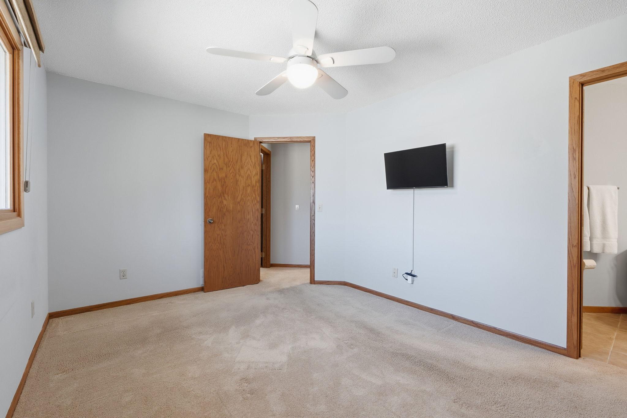 Primary Bedroom (TV stays)