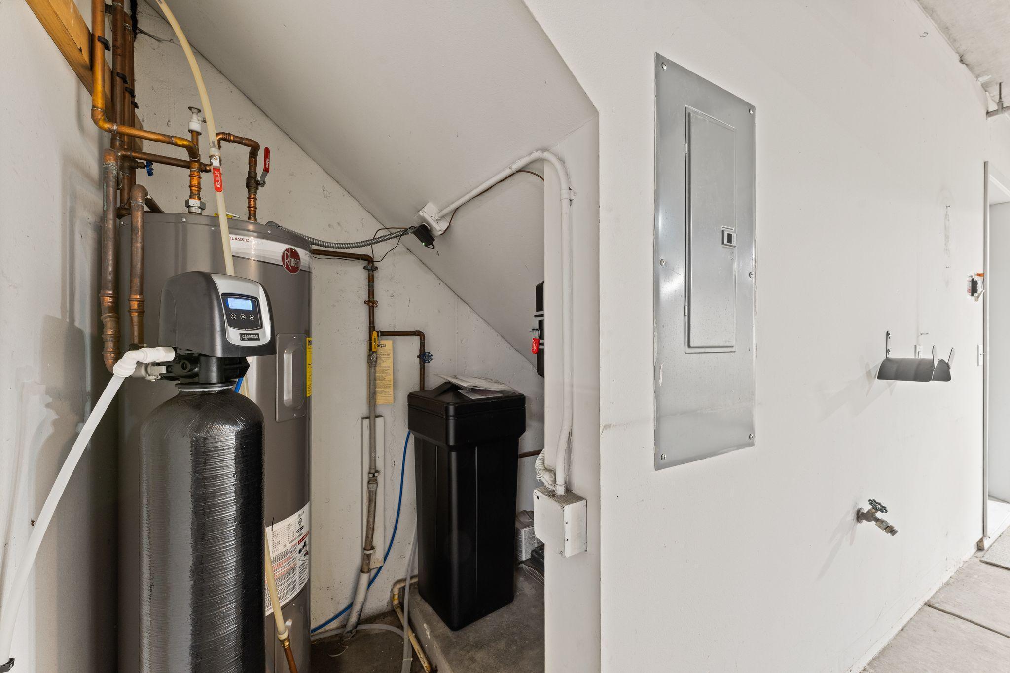 Water Heater & Softener Conveniently Located in Garage