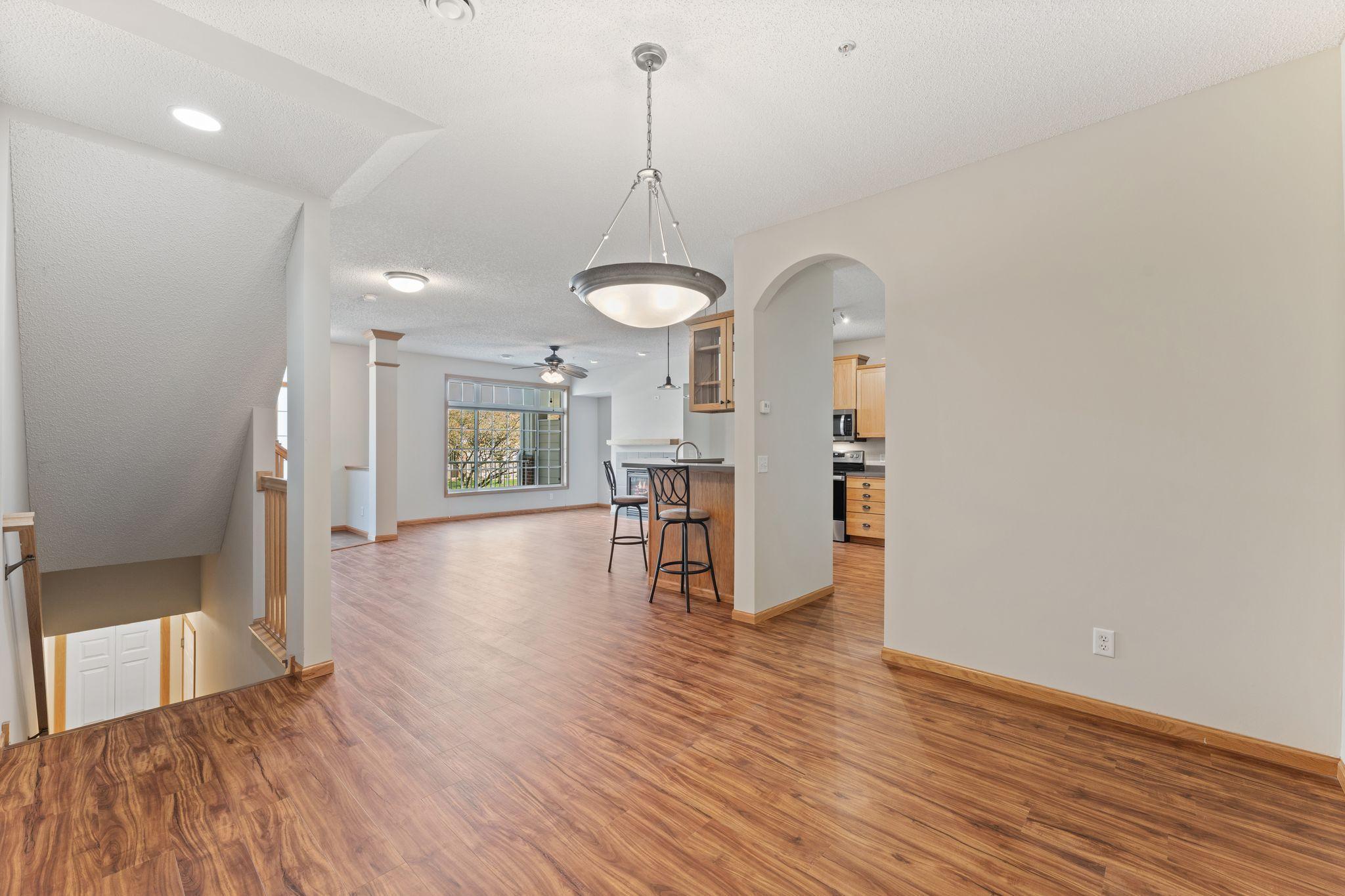 Dining Room with Arched Doorway to Kitchen