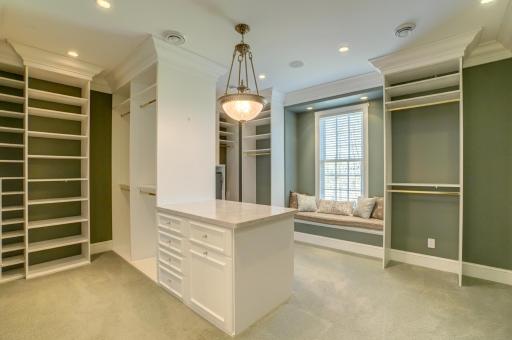 Larger of the two walk in closets in the primary bedroom.