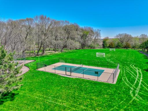 Association pickle ball court and play area.