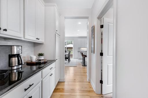 A walk through pantry and coffee bar area