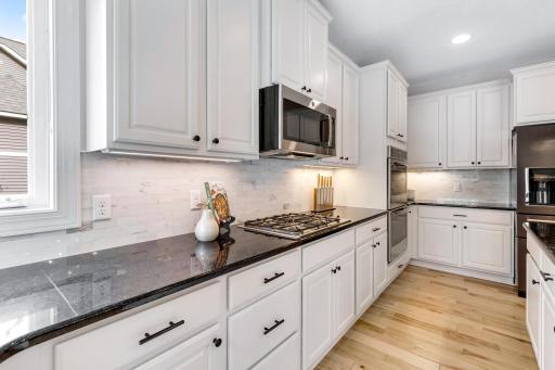 Large kitchen with brand new microwave, refridgerator and dishwasher