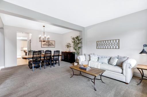 Front den open to the formal dining room