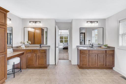 Double sink plus a vanity space in the primary bathroom
