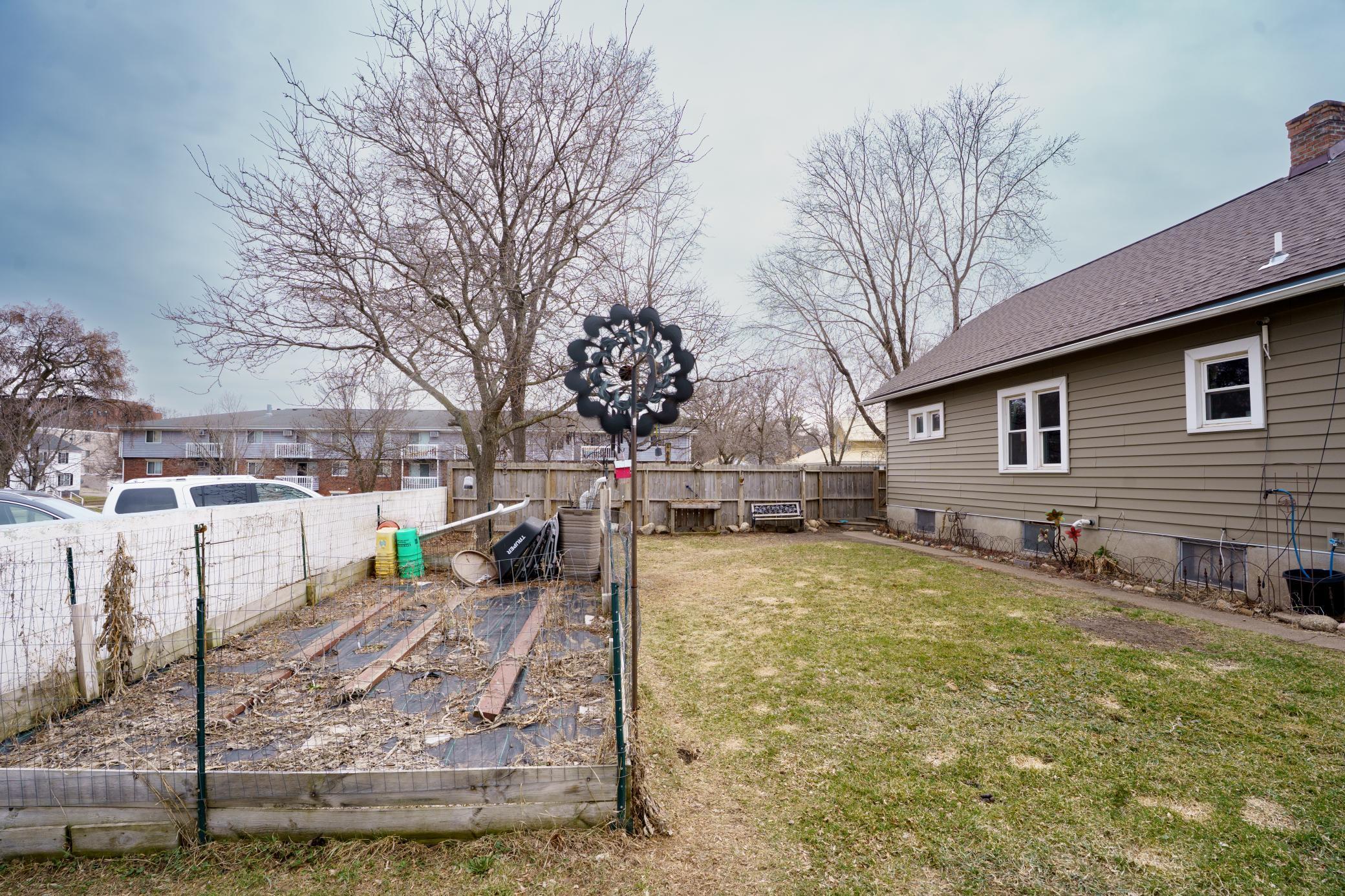 Fenced-in Raised Garden Bed
