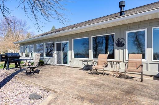 The large stamped concrete patio is perfect for summer grilling.