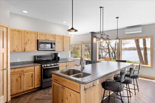 Another view of the kitchen. Enjoy lake views no matter where you are inside this home!