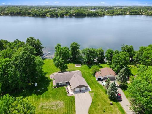 Located on Rays Lake, you'll love this stunning one level living home. The large 3 car garage offers plenty of space to toy management. A gentle gradual slope down to the lake.