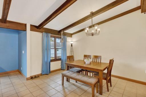 Vaulted dining area, tile flooring
