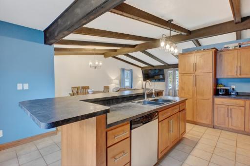 Center island with sink and dishwasher