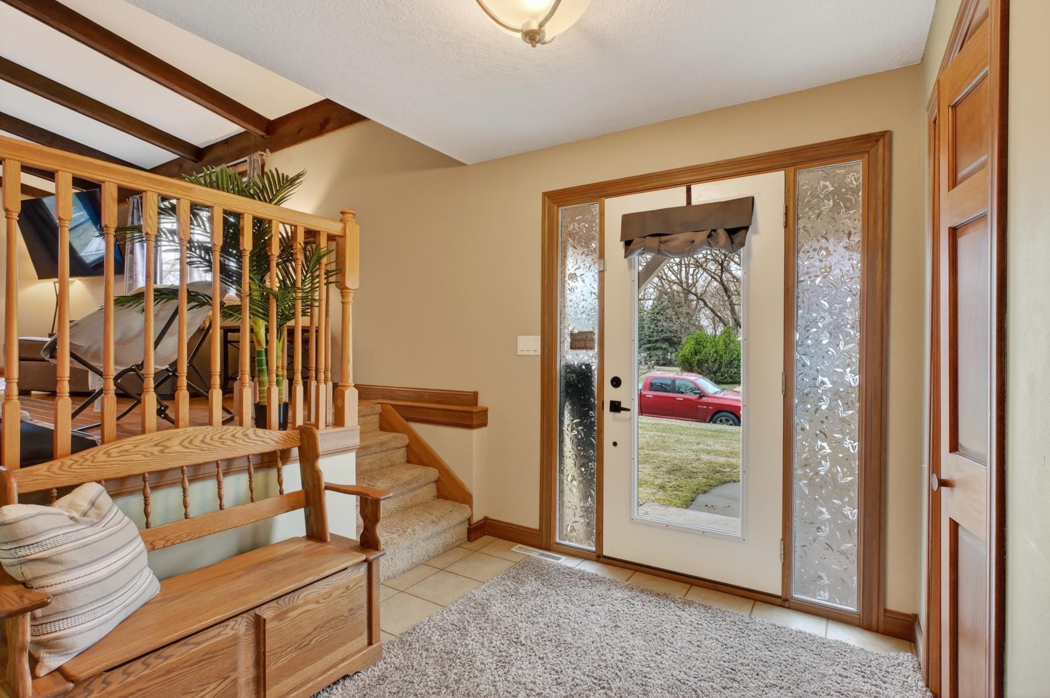 Foyer from front door also has coat closet