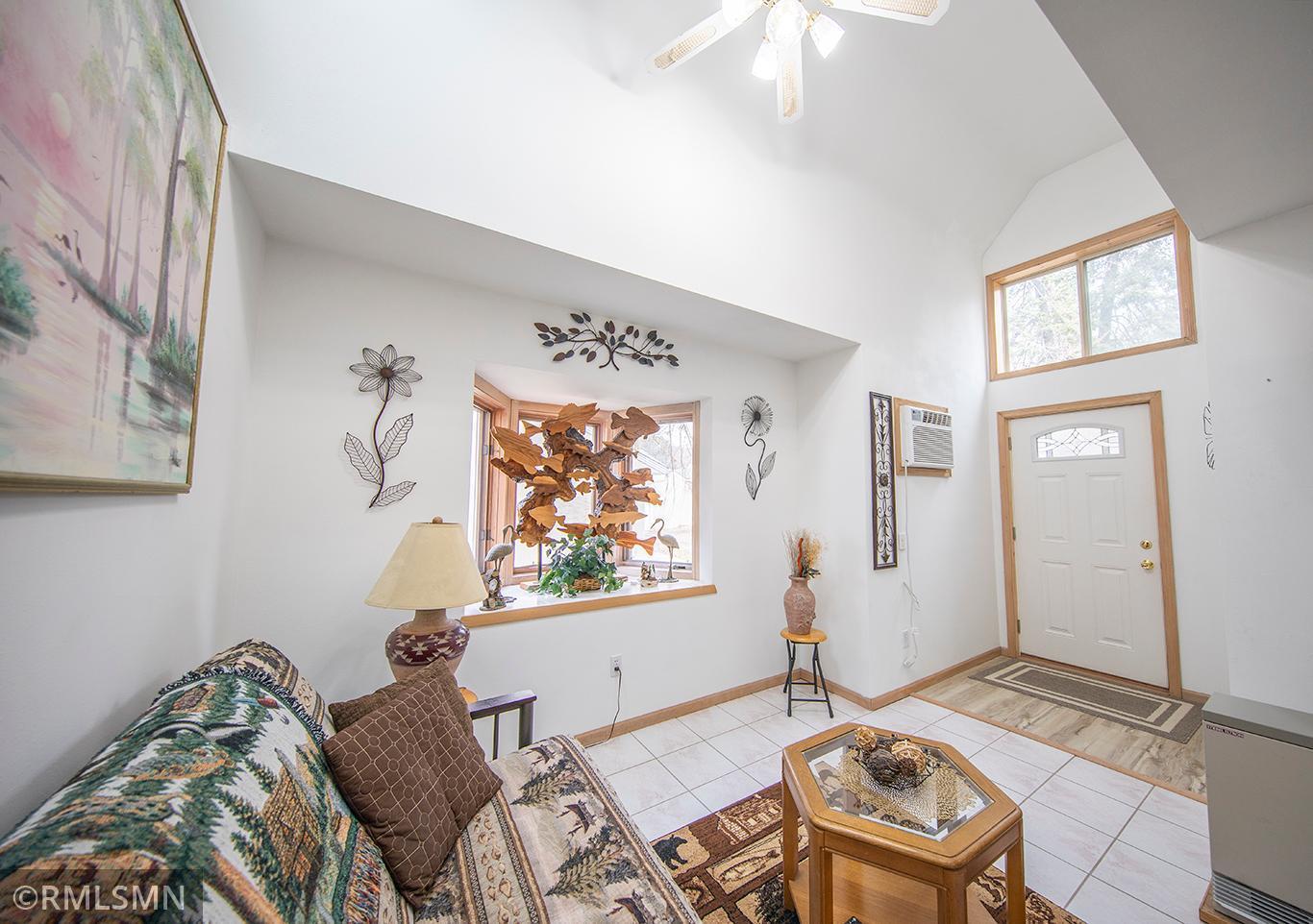 Thoughtful use of sidelights and windows throughout this home give it an air of lightness and ease.
