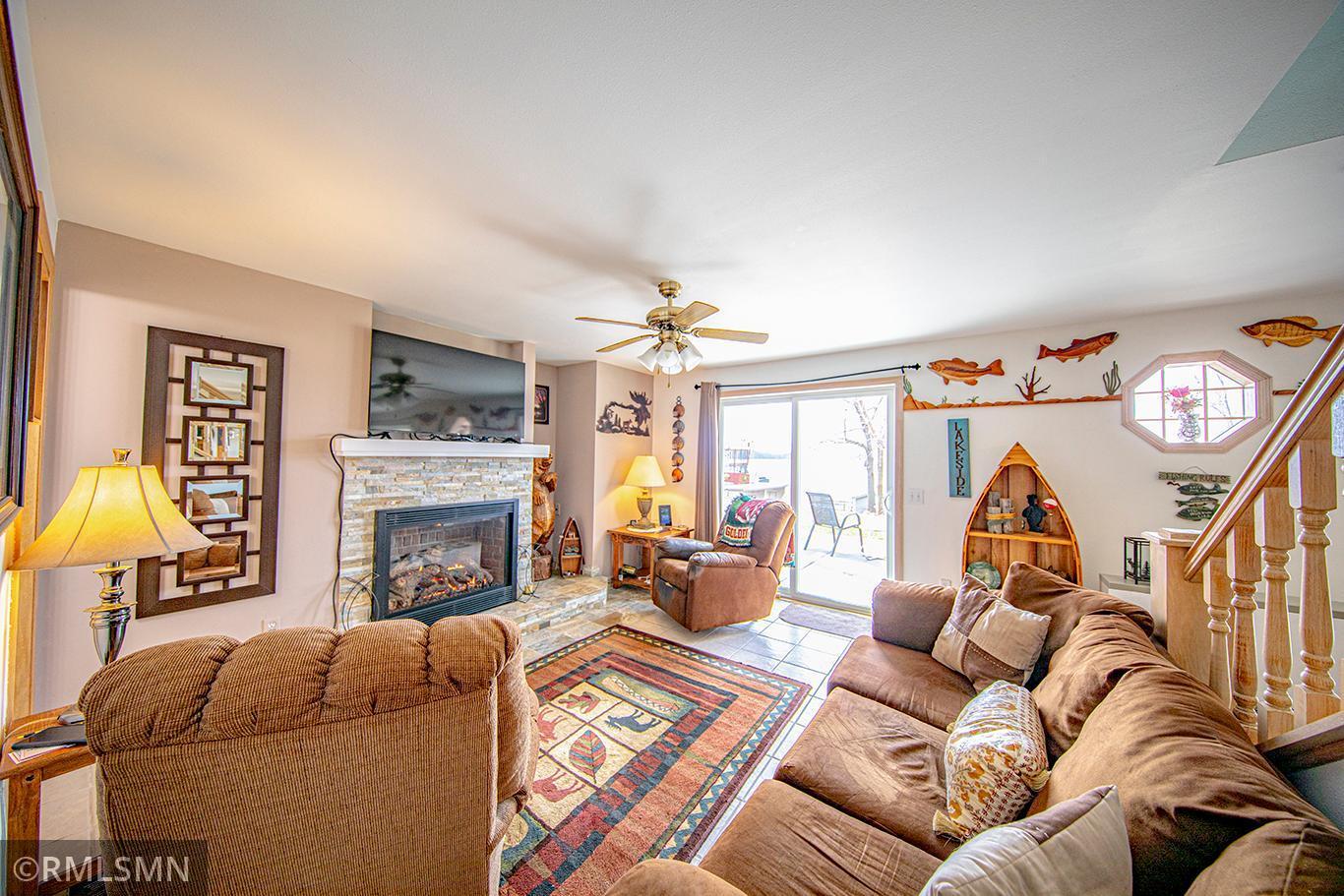 The new gas fireplace insert provides heat and warm beauty to the living room and through the home.