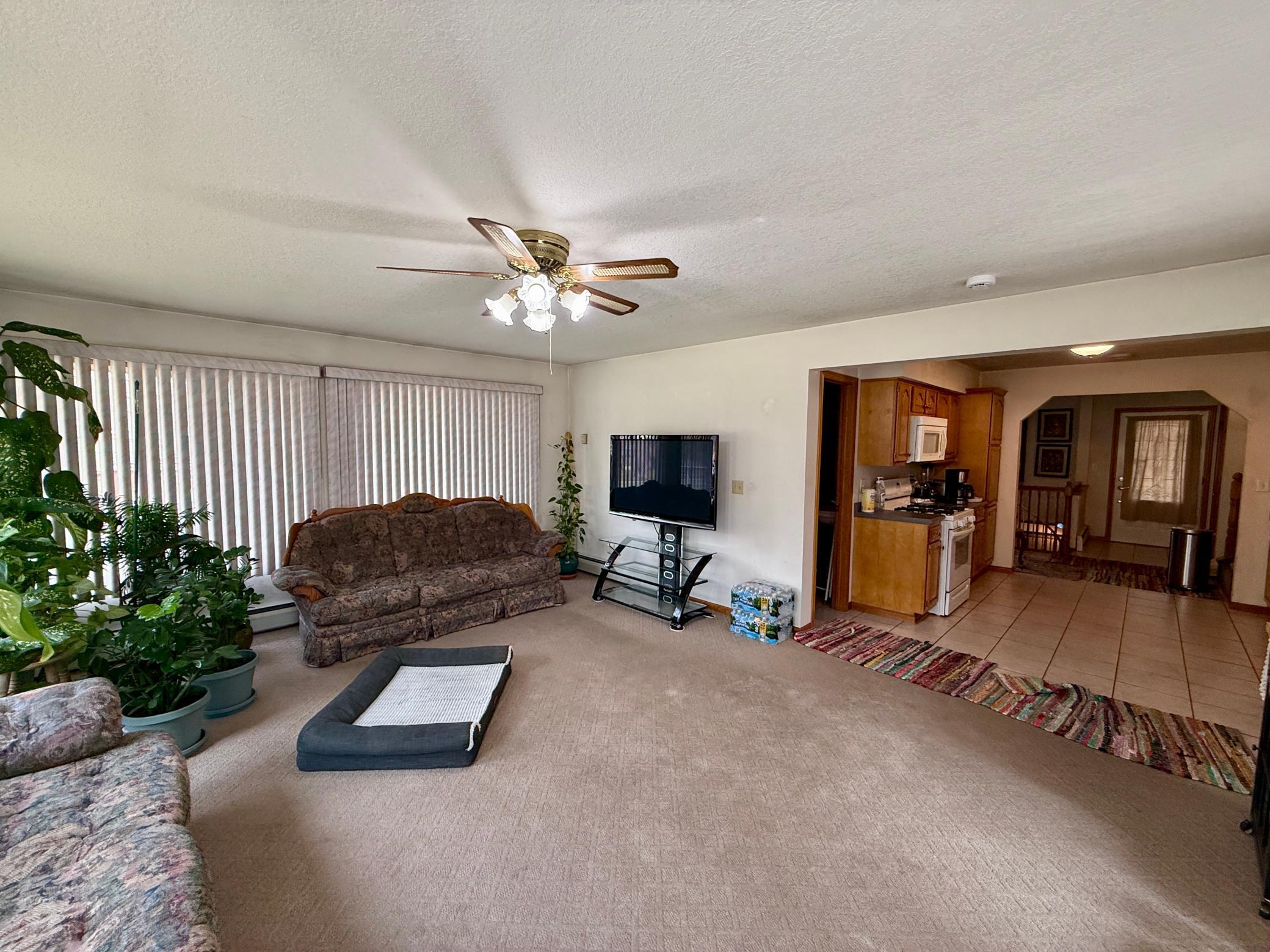 Main floor family room opens to kitchen