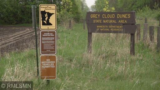 Discover 12 acres of scenic hiking trails and breathtaking views of the Mississippi River at Grey Cloud Dunes.