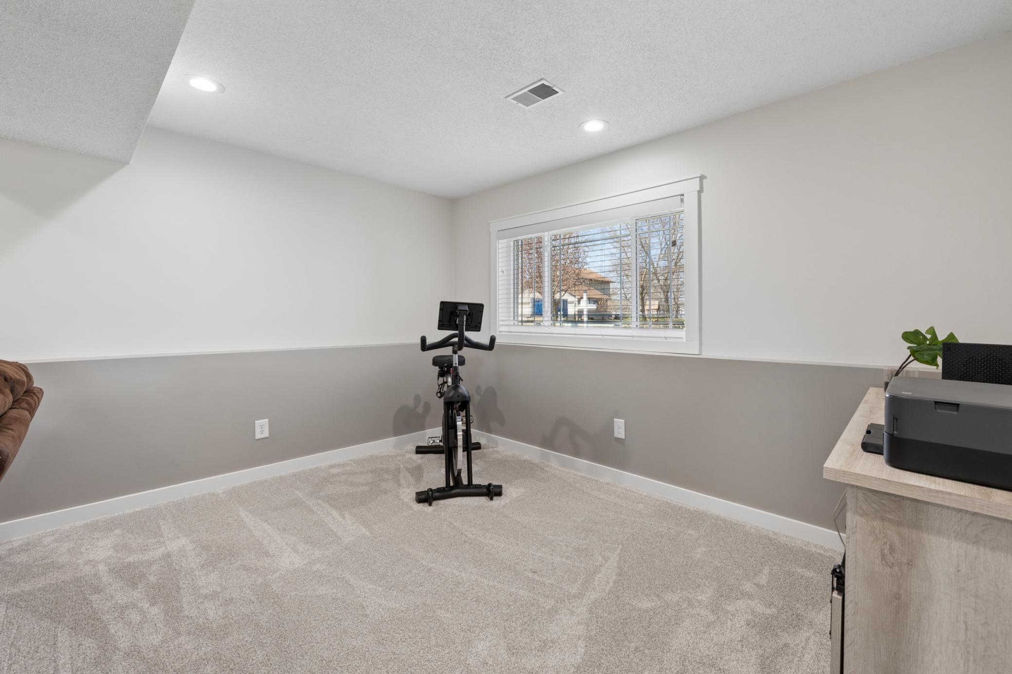 With this extra space in the lower level, it can be an office or your favorite space.