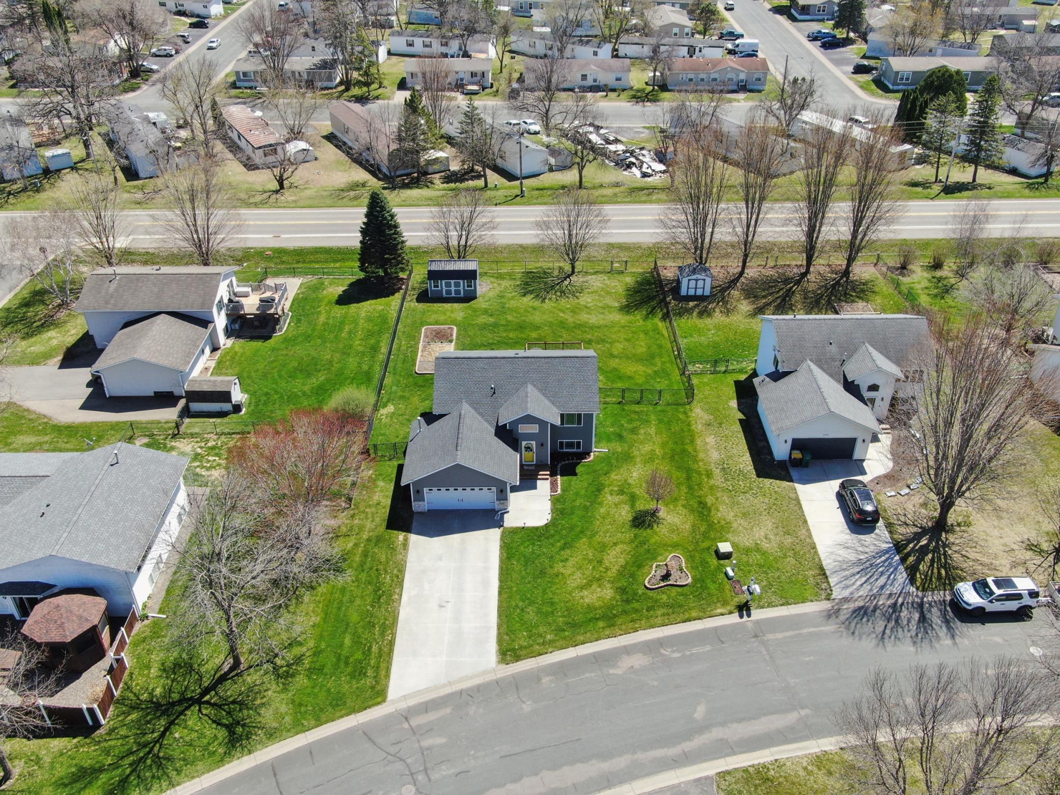 Amazingly large yard bursting with flowers.