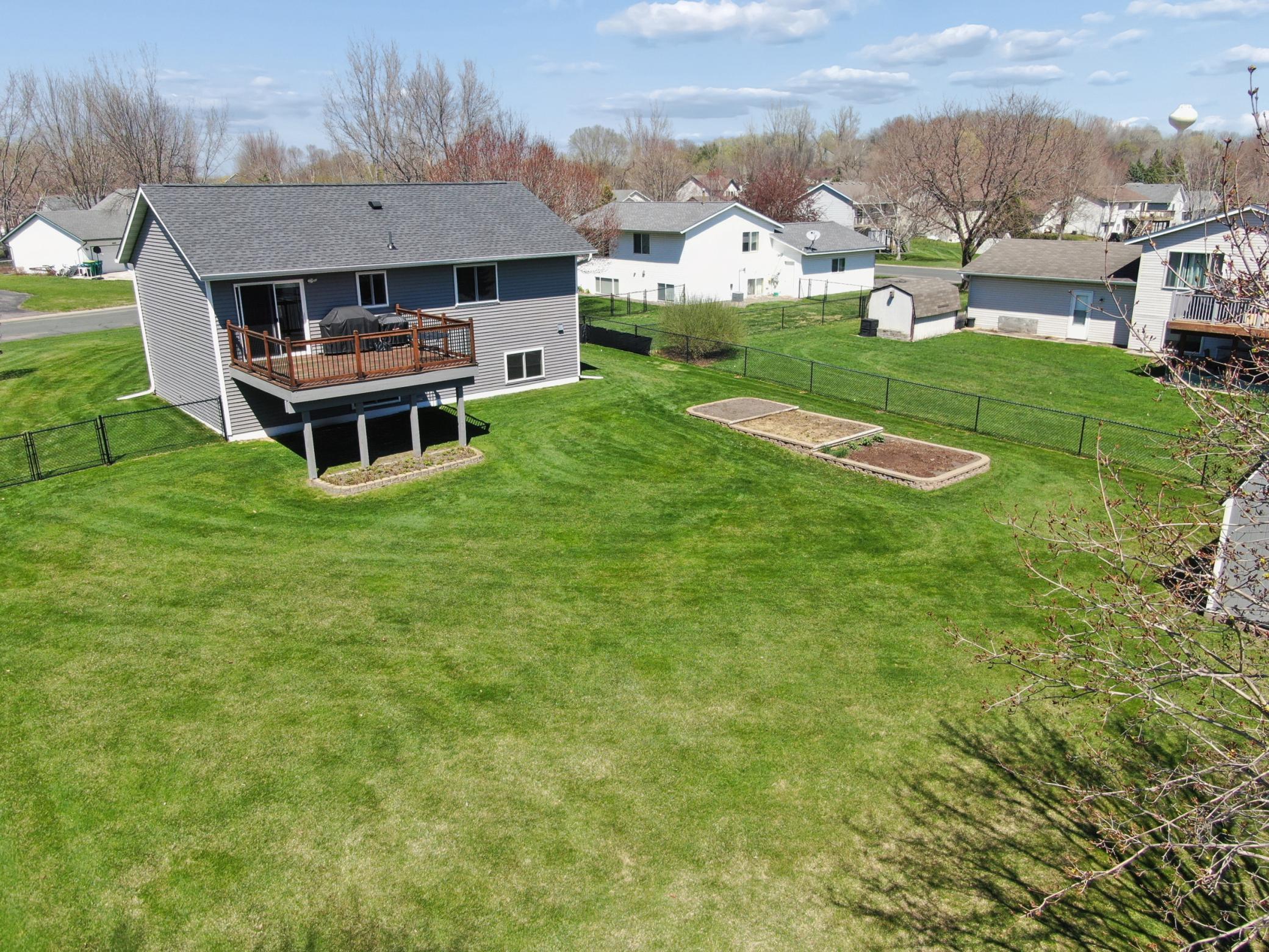 The beautiful backyard has plenty of room to play.