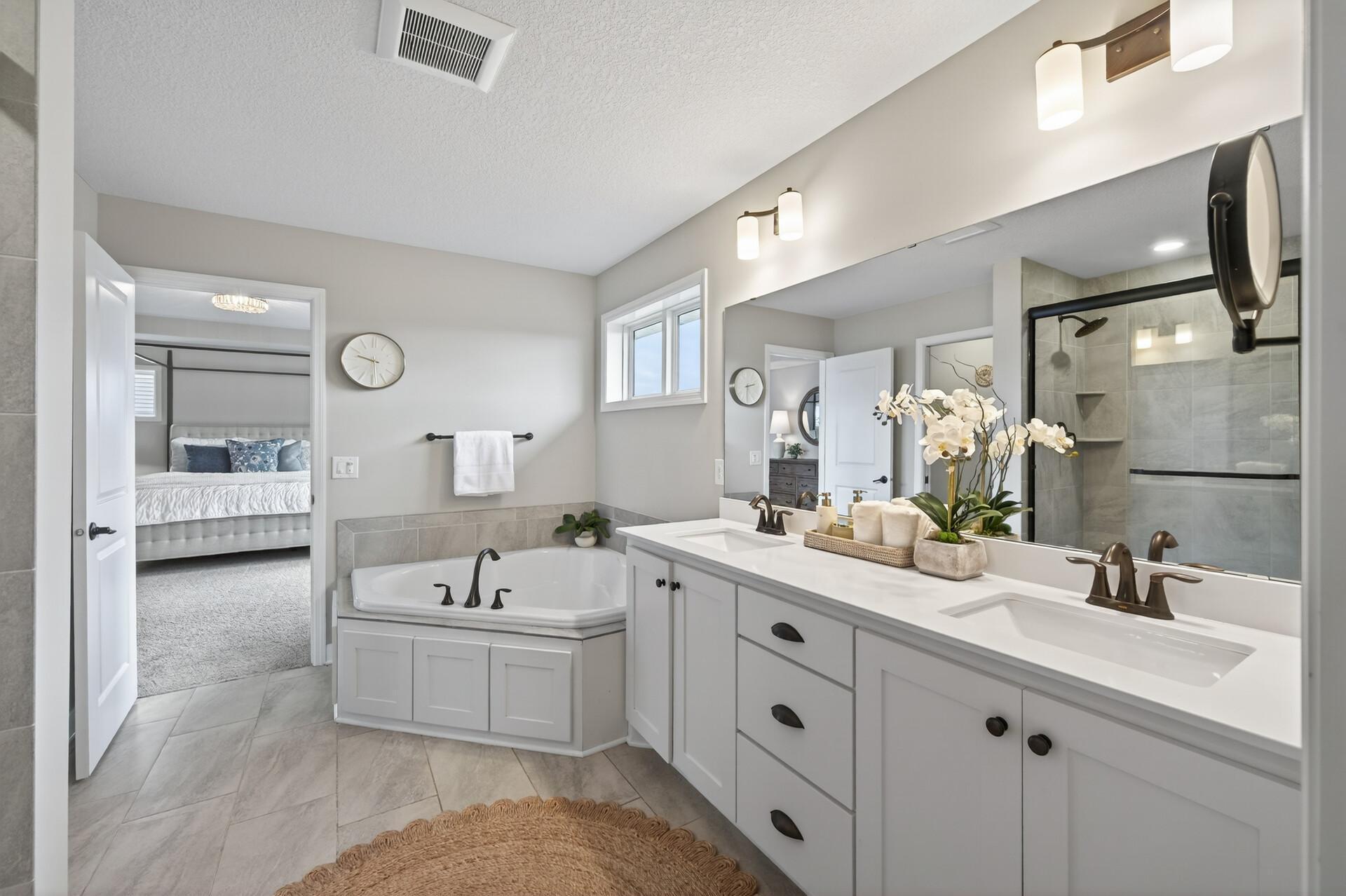 Primary Bathroom with Corner Tub & Double Vanity