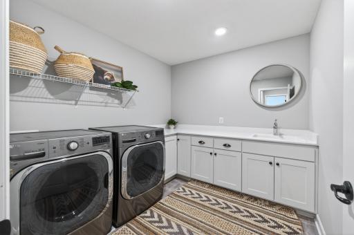 Upper Level Oversized Laundry Room with Sink
