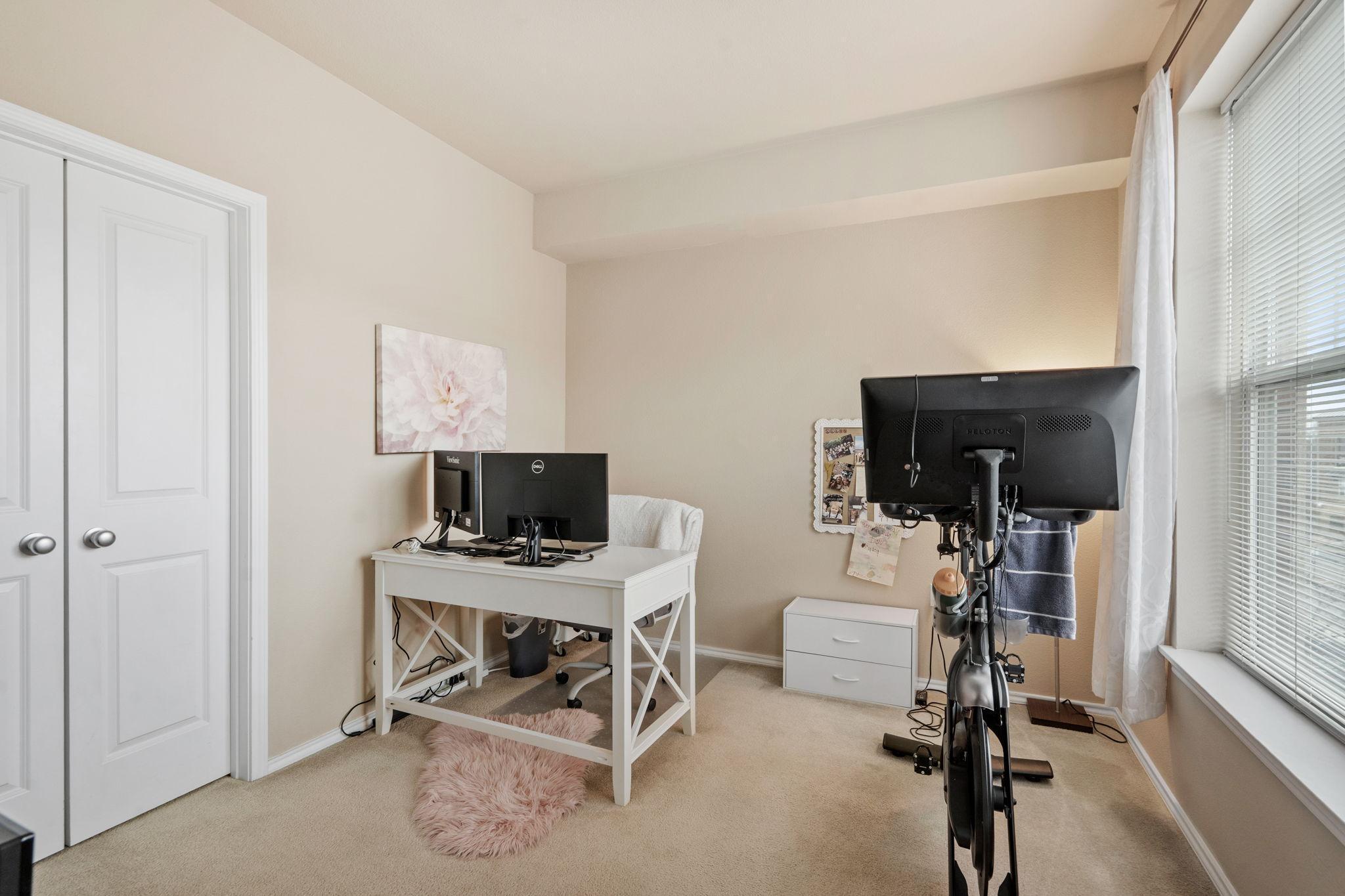 Bright second bedroom with walk in closet