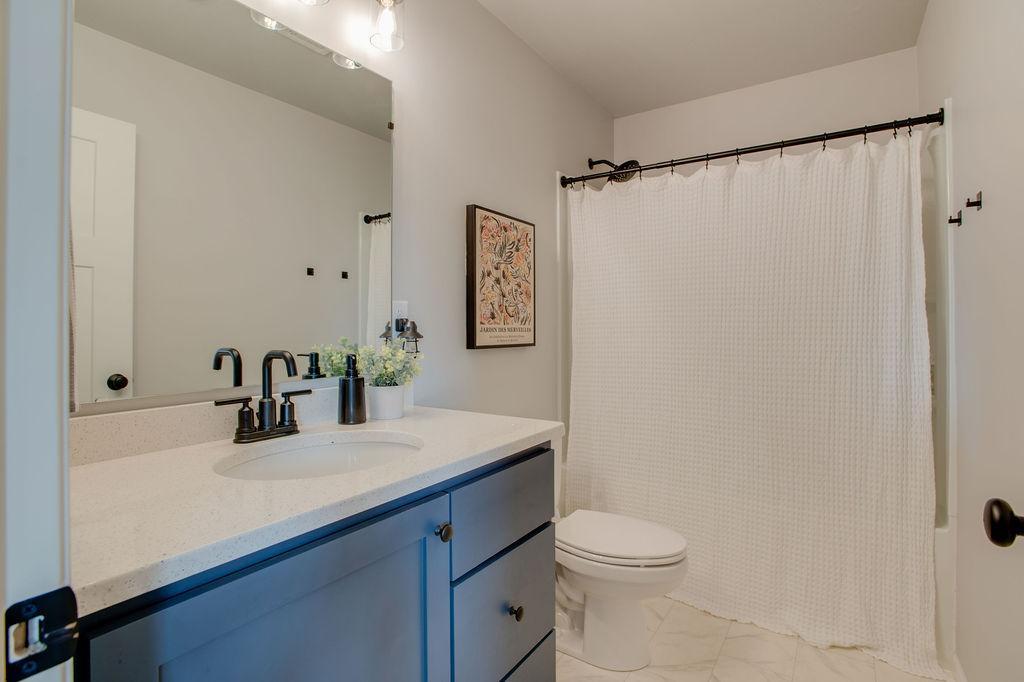 Upgraded Quartz countertops & fixtures