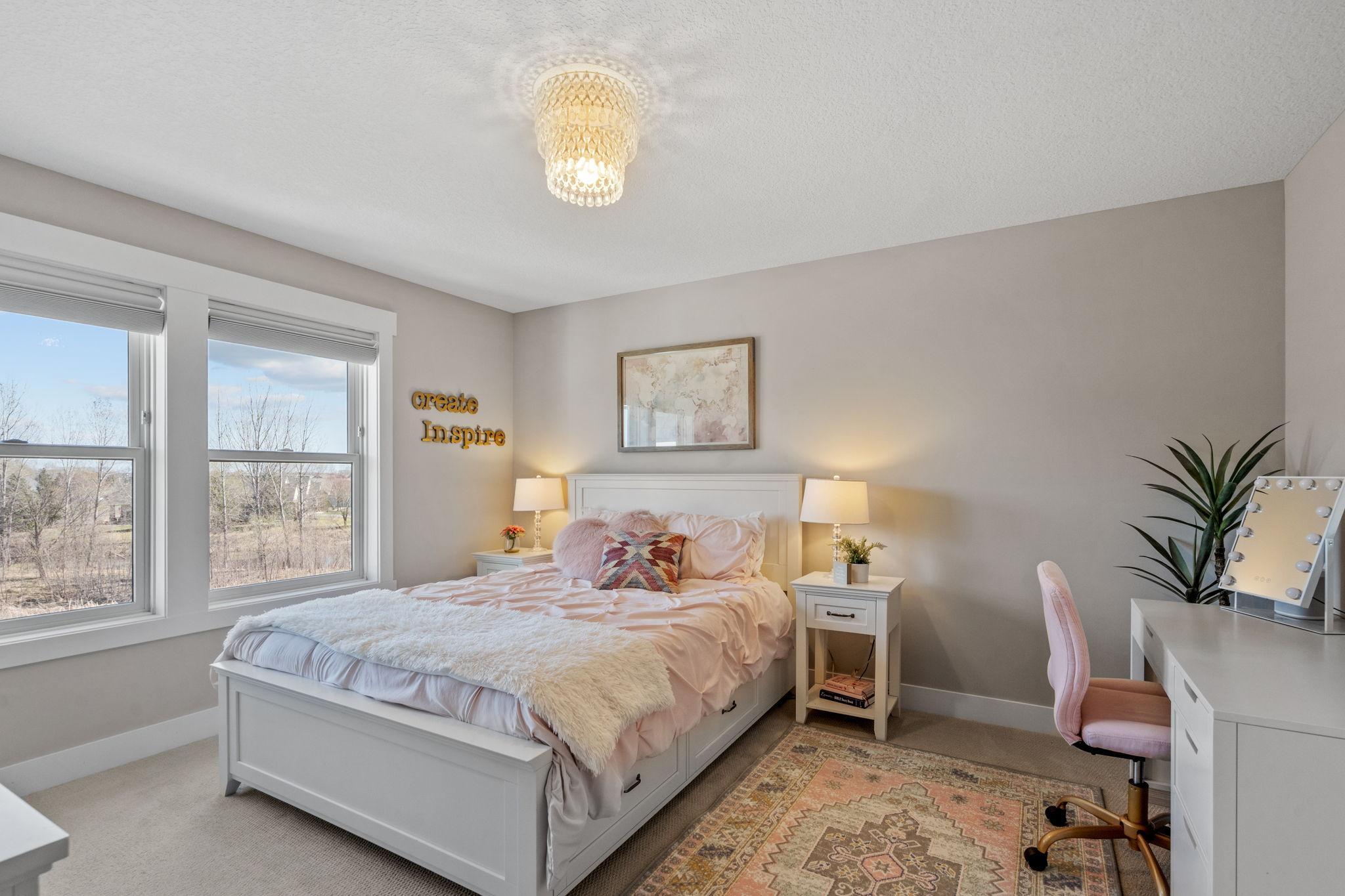 Light-filled bedroom #4 with peaceful views and a calm, comfortable atmosphere.