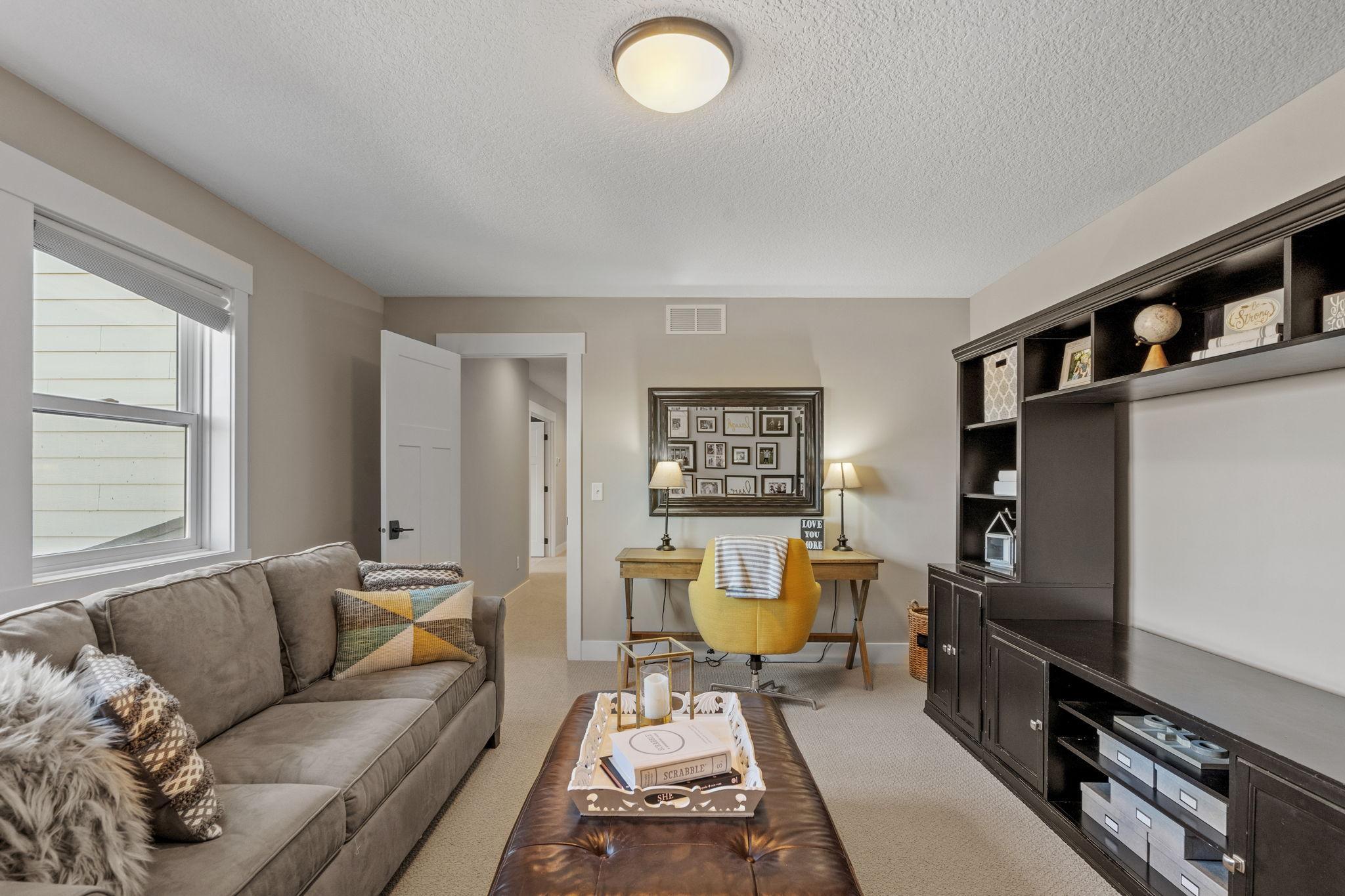 A versatile upper-level retreat with plenty of space to work, relax, or unwind.