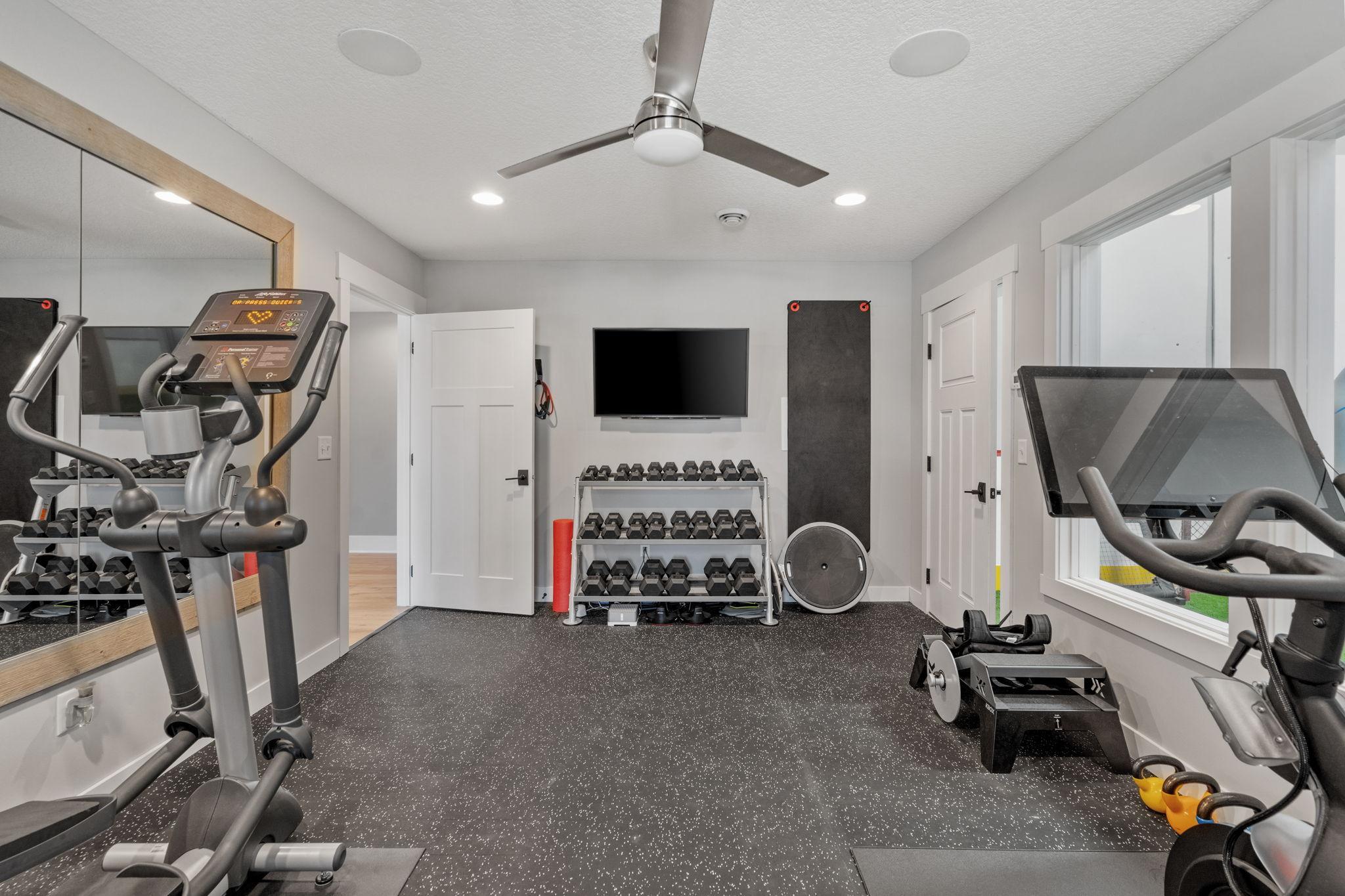 A true at-home training setup. Durable rubber flooring built to handle everything from weights to cardio, plus plenty of space to create a fully customized workout zone.
