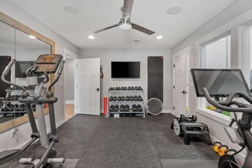 A true at-home training setup. Durable rubber flooring built to handle everything from weights to cardio, plus plenty of space to create a fully customized workout zone.