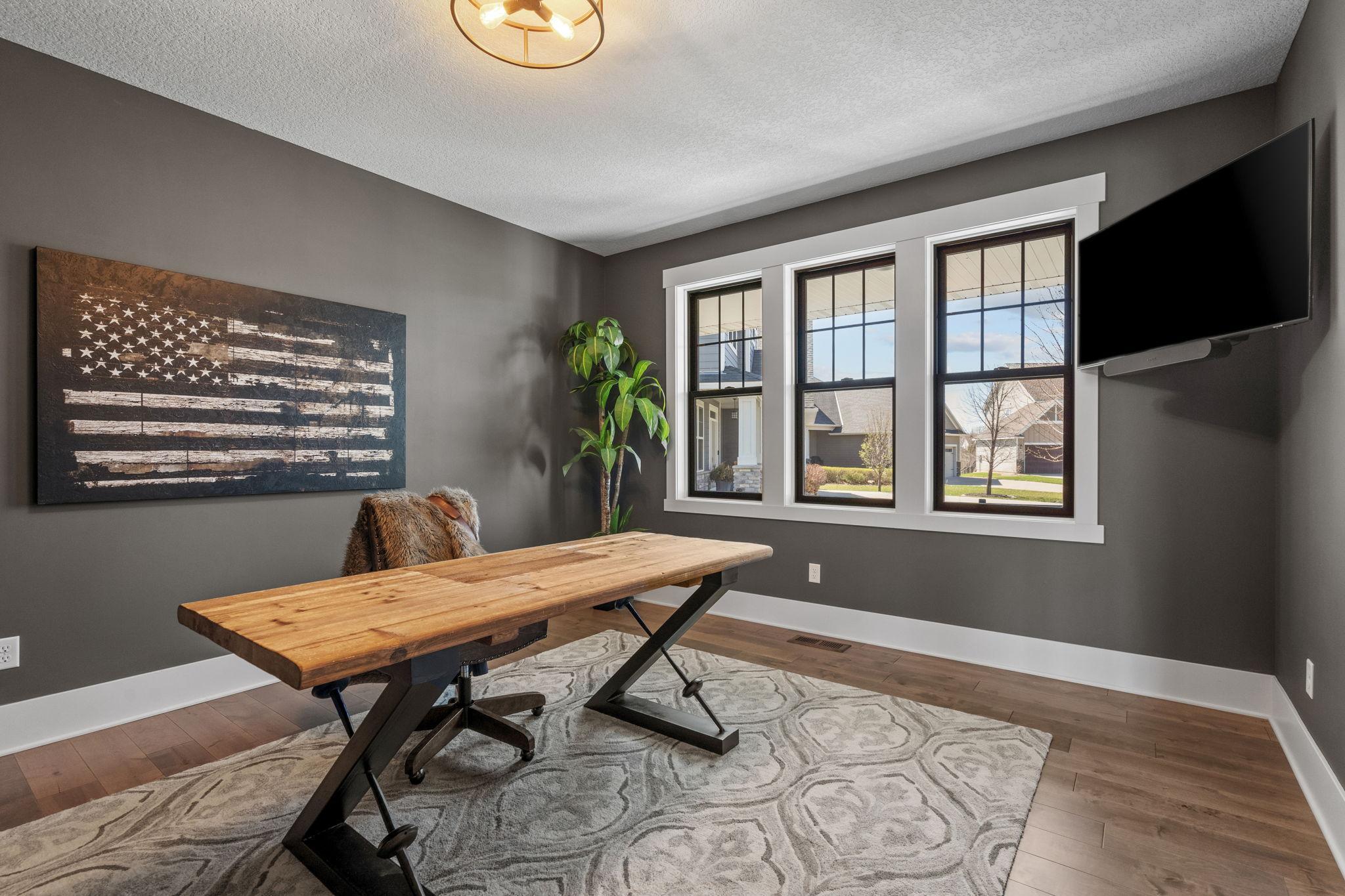 A refined space with abundant natural light offers a warm, energizing setting for work, study, or managing daily tasks.