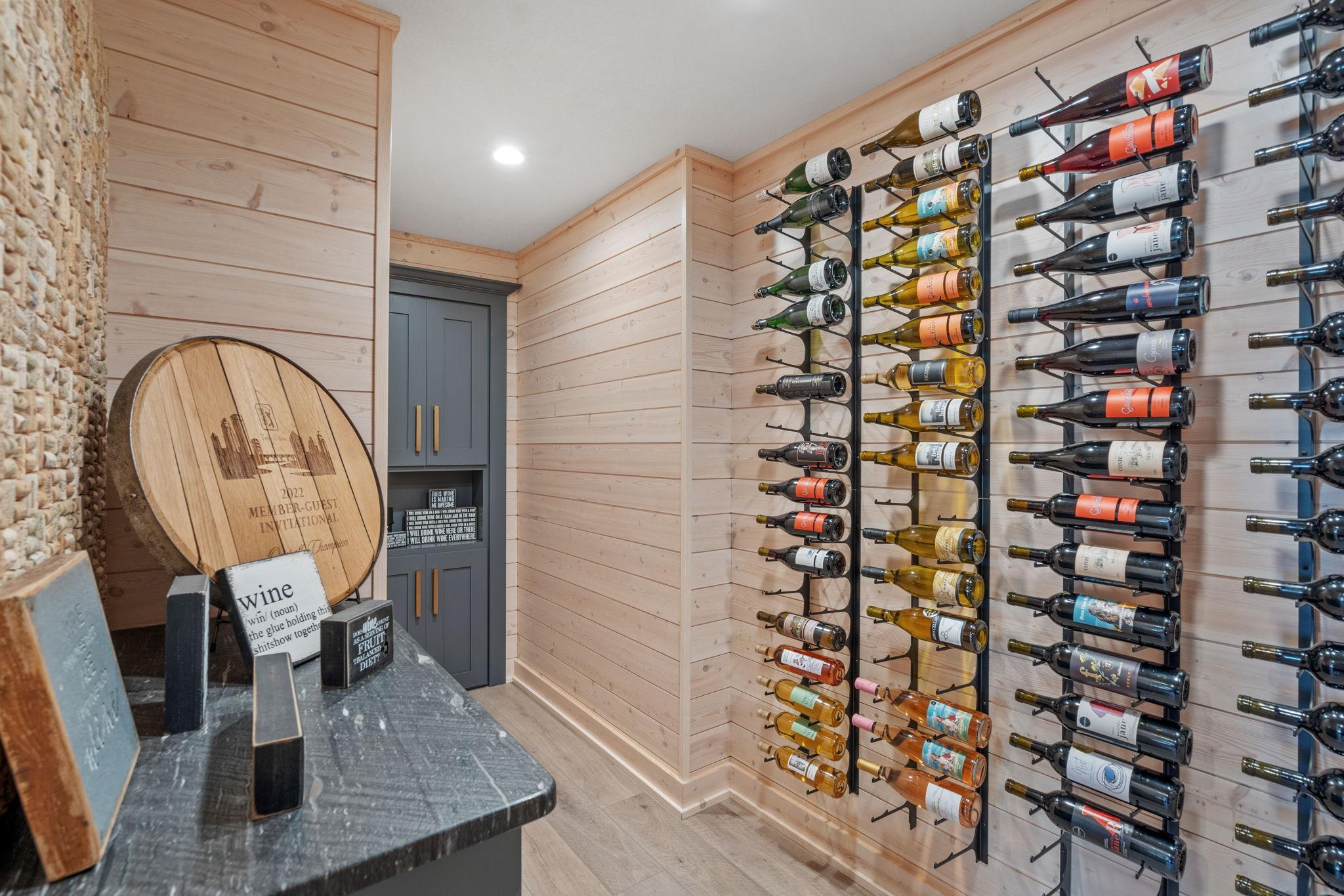 Designed to impress! This dedicated wine room turns your collection into a statement piece, blending function with elevated style.