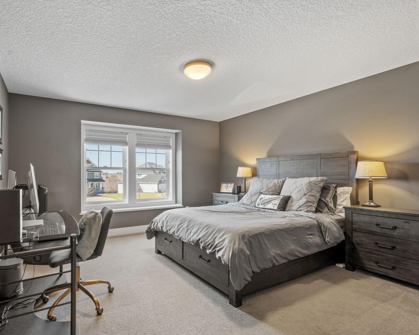 Bedroom #2 with ideal proportions, offering plenty of space for a full furniture set without feeling crowded.