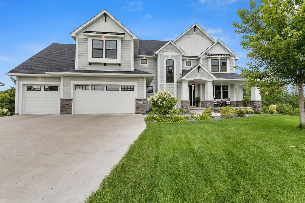 Picture-perfect from the moment you arrive. Charming architecture, lush lawn, and inviting front porch set the tone for what’s inside.