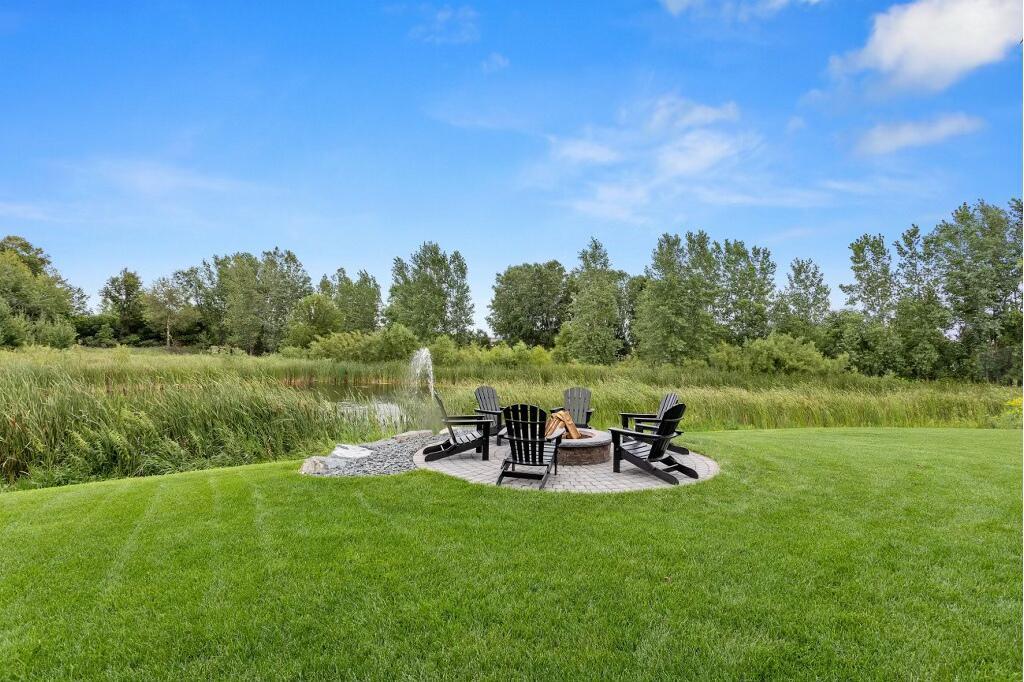 Built-in bonfire pit overlooking the pond. Perfect for summer nights under the stars or take in the view as the pond turns into a skating rink in the winter.