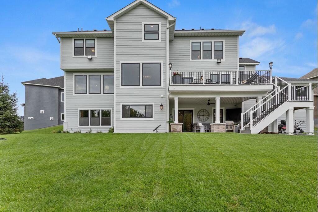 A setup that checks every box…multiple outdoor living spaces, walkout access, a maintenance-free deck, and a covered patio below for effortless indoor-outdoor living.