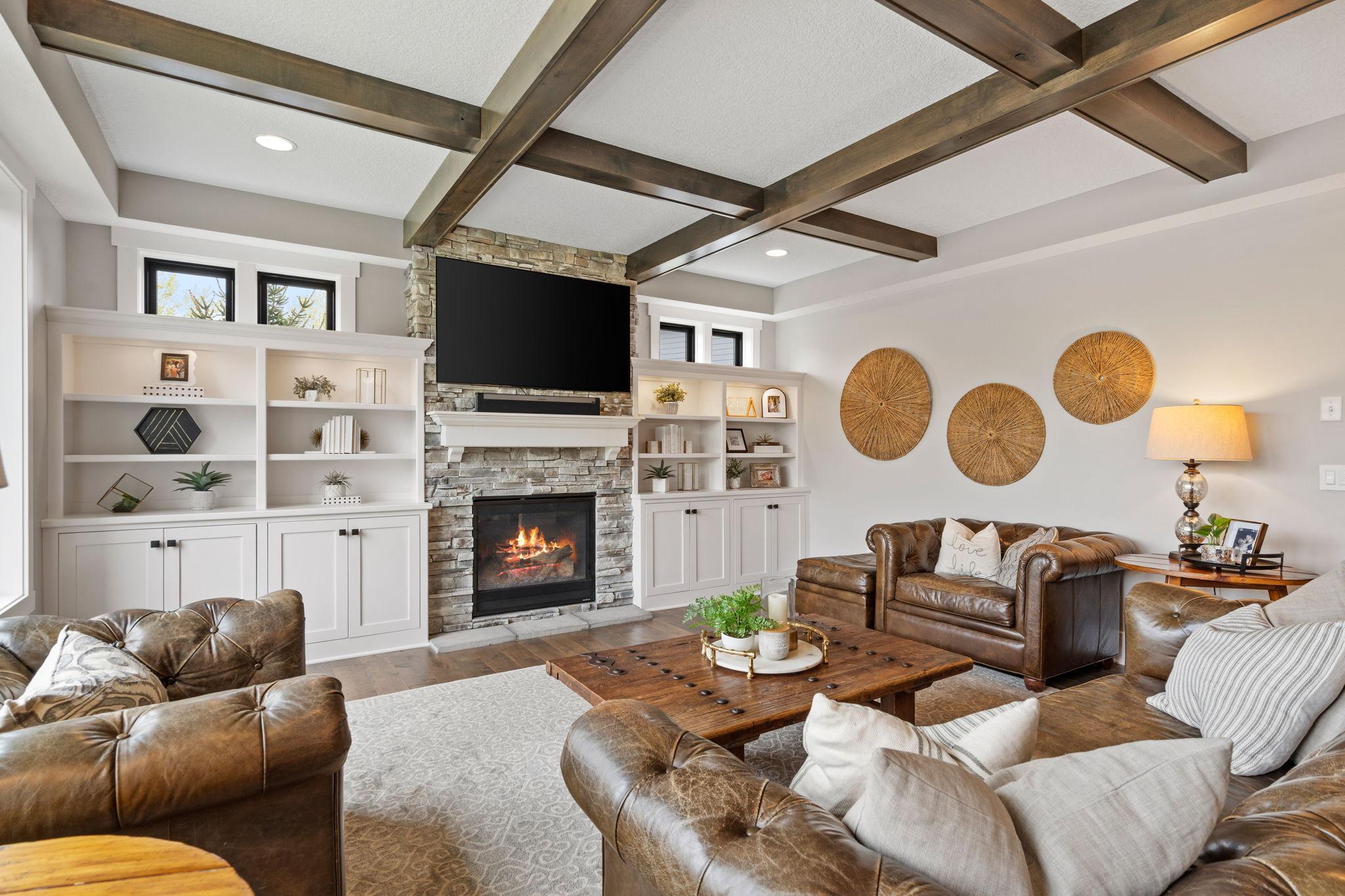 Custom built-ins offer the perfect blend of style and storage with beautifully lit display shelving.