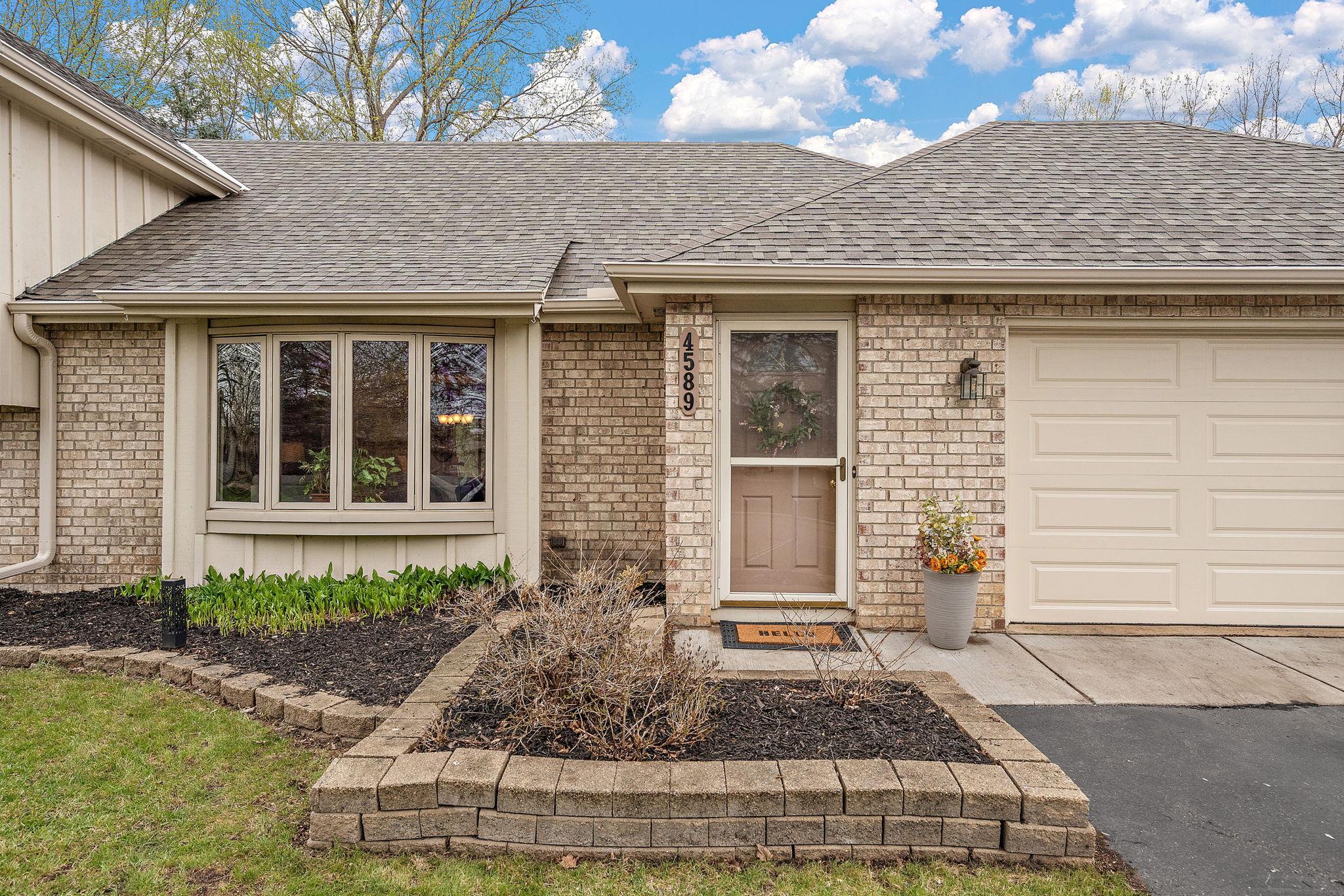 Welcome home to 4589 Saddlewood Drive! Well-kept flower beds are ready for Spring blooms!