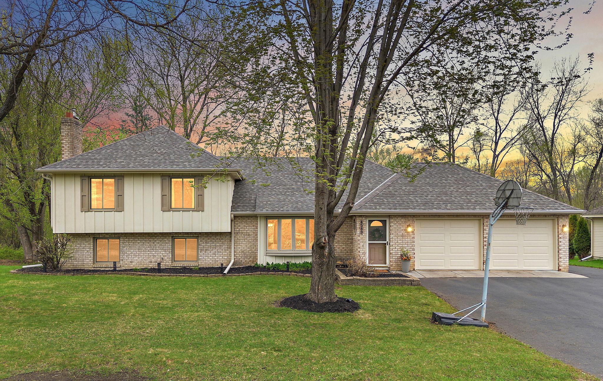 Twilight view of the front of the home.