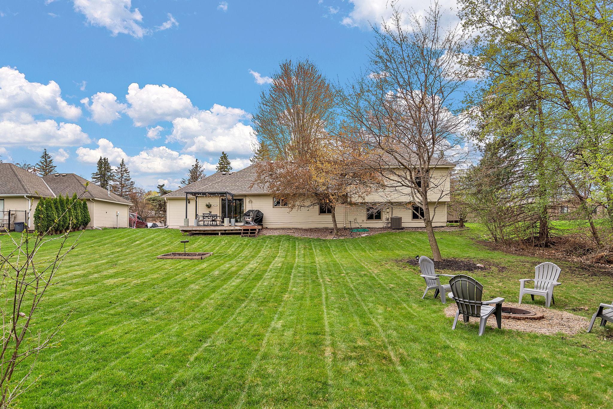 The backyard is quite spacious and ideal for hosting lawn games or for gardening.