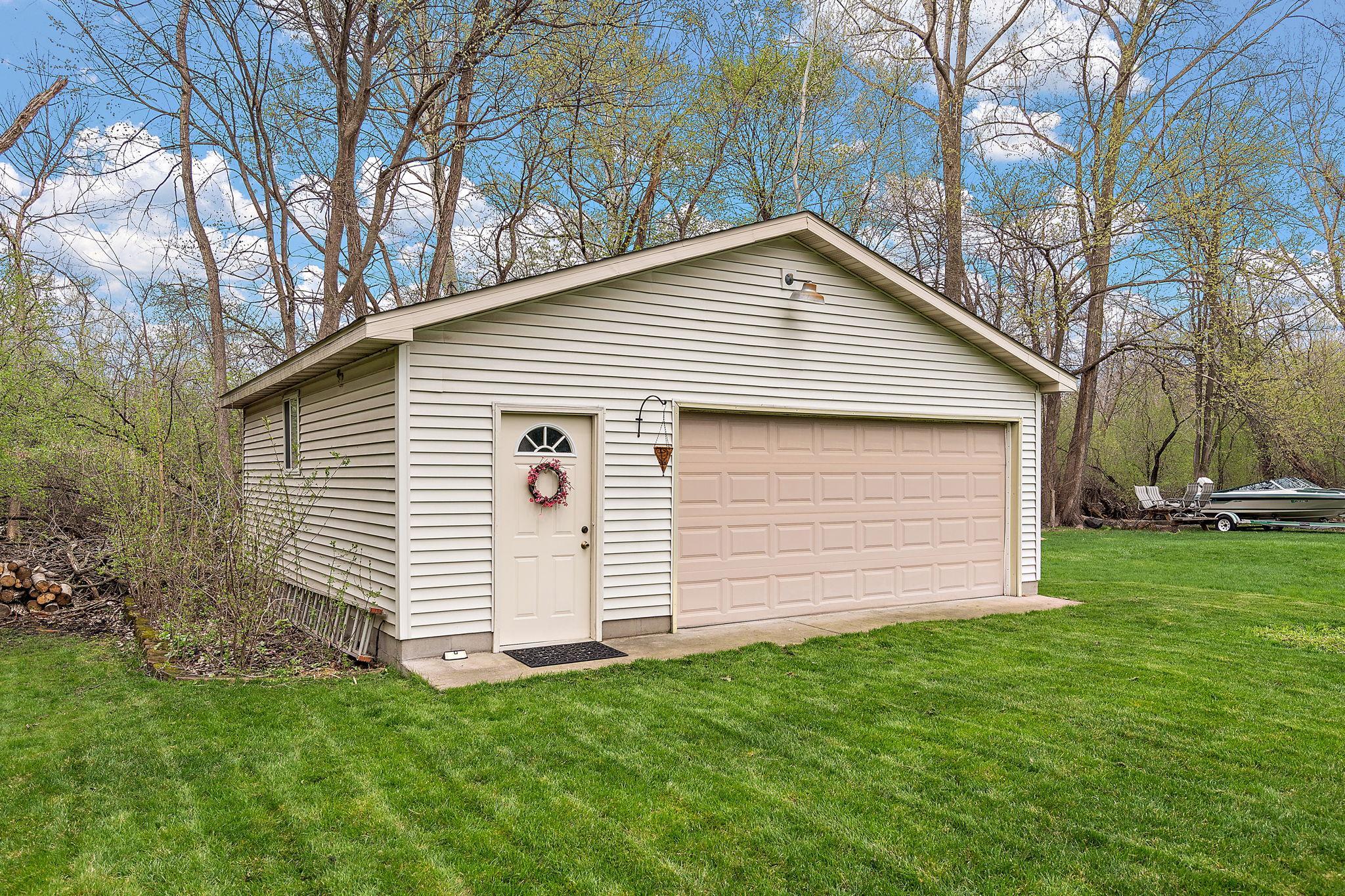 The backyard garage is 25'x25' with a door 7 high x 16 wide and is heated for comfort during the cold winter months with a yard light conveniently located above the garage door.
