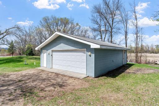 The detached garage gives this property something rare: genuine separation between living space and work/storage space. Park the trucks, store the boat, run the workshop all without any of it crowding your lake retreat.