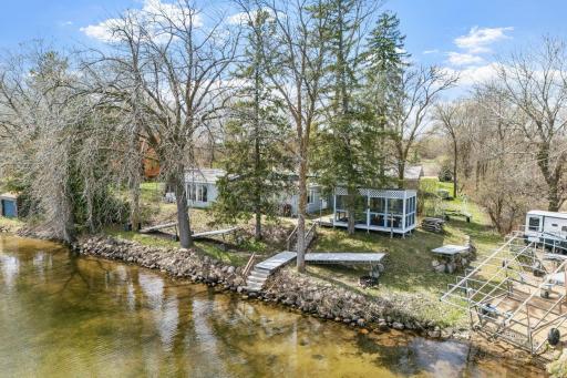 Easy shoreline access, mature trees, and room to breathe.
