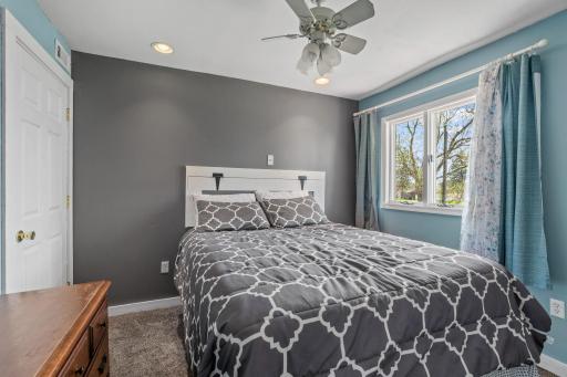 Recessed lighting, a ceiling fan for warm summer nights, and soft carpet underfoot, this bedroom is where Friday night exhaustion melts away and you wake up ready to do it all over again.